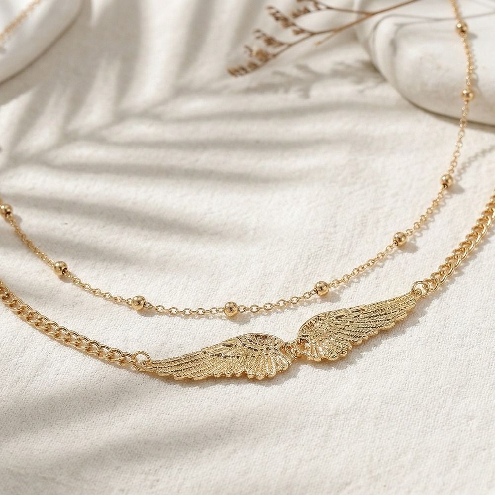 Elegante dubbele laag vleugels - Body Jewelry For You recensie en prijs